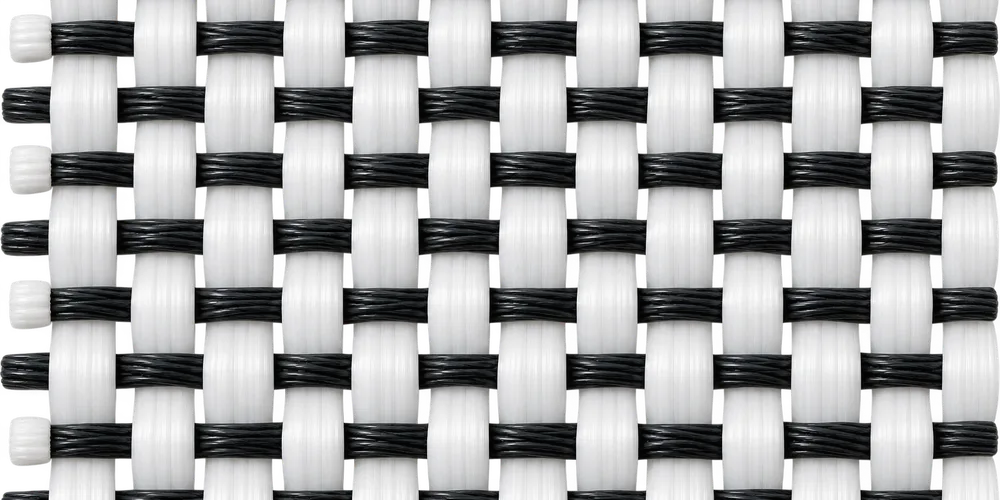 Close-up of woven filter fabric with black conductive yarns running in the weft direction only