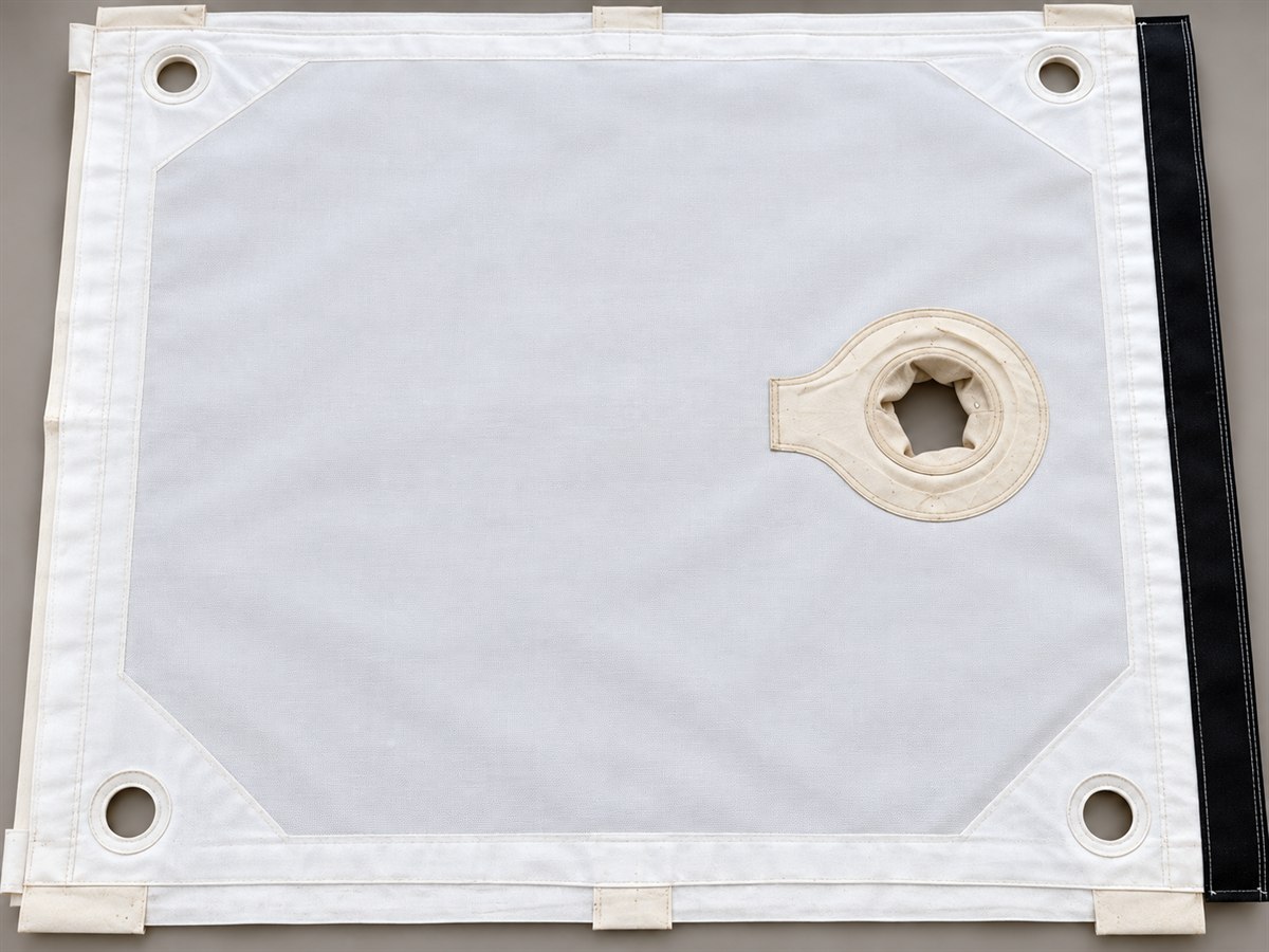 Barrel feed neck on a DFR filter press cloth, reinforced and stitched into the cloth face