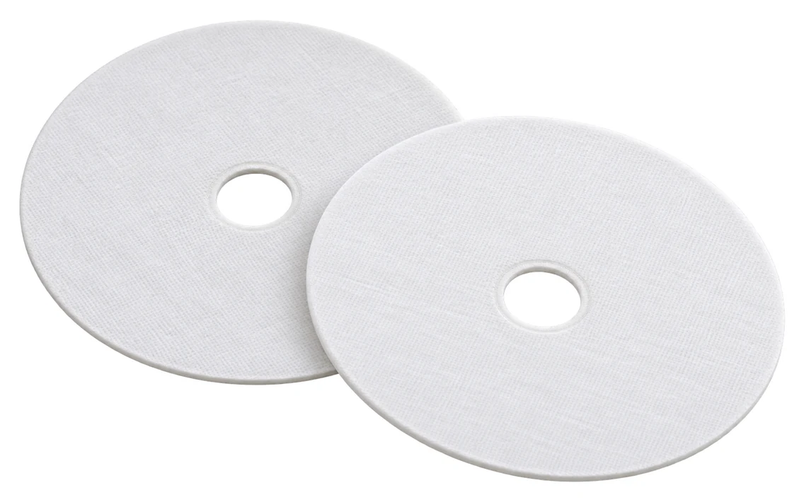 Two sparkler filter pads, thermal bonded with a central bore